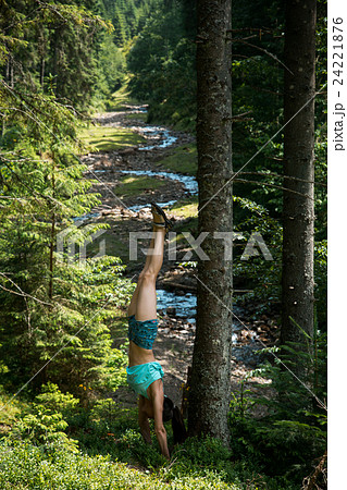 girl with nice body stands on the head during yoga girl with nice body stands on the head during yoga 24221876