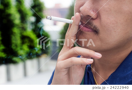 outdoor smoker asian man outdoor smoker asian man 24222940