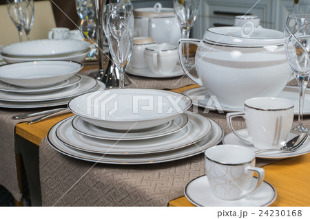 white luxury ceramic dinner service on table white luxury ceramic dinner service on table 24230168