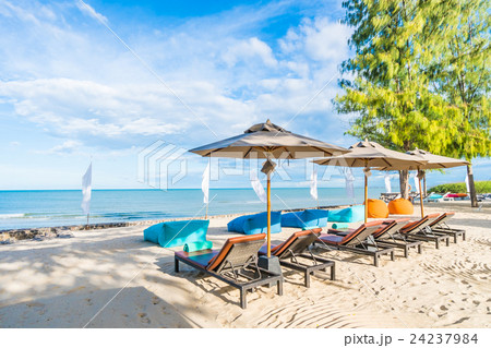 Umbrella and chair 24237984