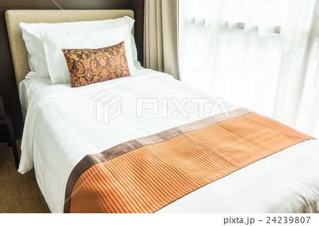 Pillow on bed 24239807