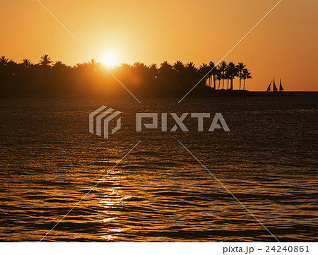 Sunset over island Sunset over island 24240861