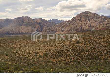 Nevada,Red Rock Canyon, Cloudy sky over rock mountains Nevada,Red Rock Canyon, Cloudy sky over rock mountains 24240952