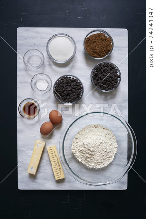 Overhead view of bowl of ingredients on marble board
 24241047