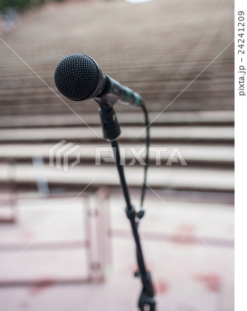 Microphone and empty amphitheater Microphone and empty amphitheater 24241209