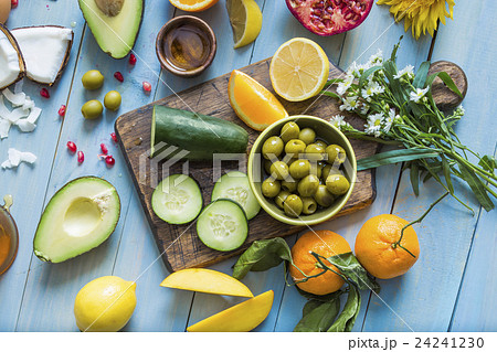 Overhead view of table with various vegetables and fruits 24241230