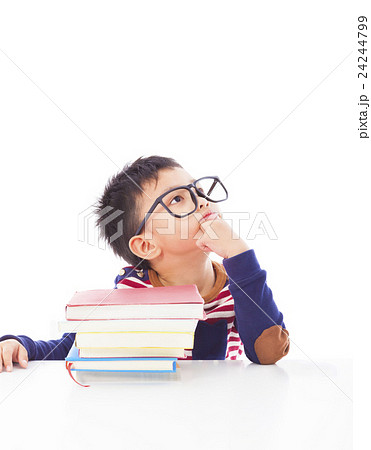 boy thinking  during preparing homework 24244799