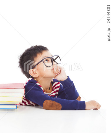 little boy thinking or dreaming little boy thinking or dreaming 24244801