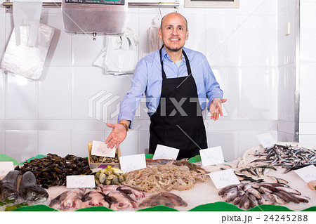 Smile man salesman chilled fish 24245288