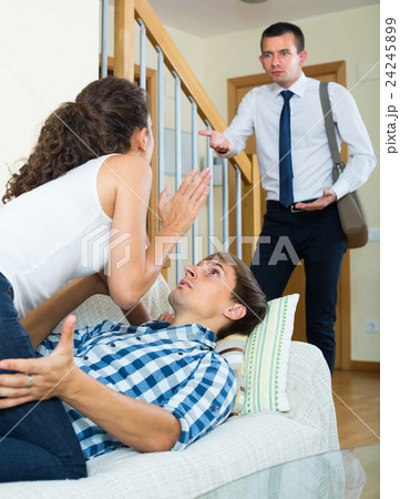 Man seeing girlfriend cheating on him. Man seeing girlfriend cheating on him. 24245899