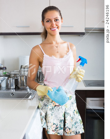 Attractive woman cleaning kitchen . 24246196