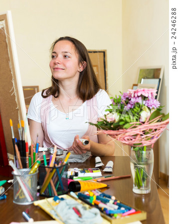 young artist paints a picture young artist paints a picture 24246288