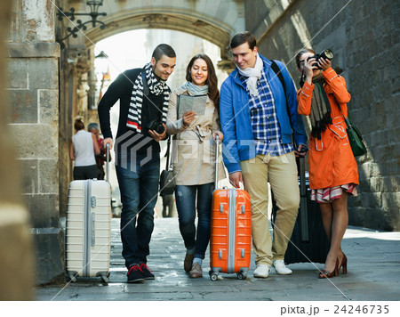 Friends with luggage outdoor 24246735