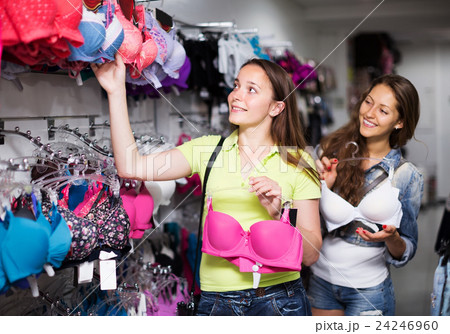 Two women choosing underwear in shop Two women choosing underwear in shop 24246960