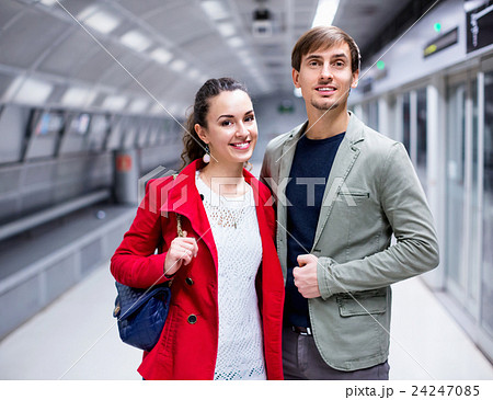 Portrait of couple in jackets at subway station 24247085