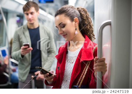 Passengers in metro wagon. 24247119
