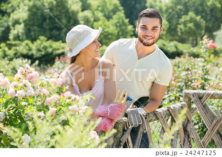Young couple gardening together . 24247125