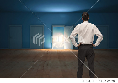 Composite image of rear view of classy young businessman posing Composite image of rear view of classy young businessman posing 24250496