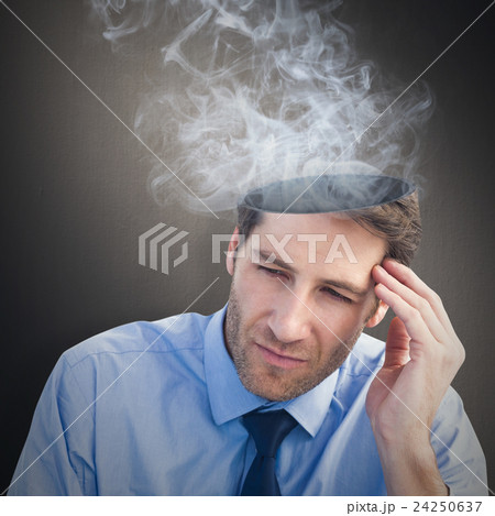 Composite image of stressed businessman holding his head Composite image of stressed businessman holding his head 24250637