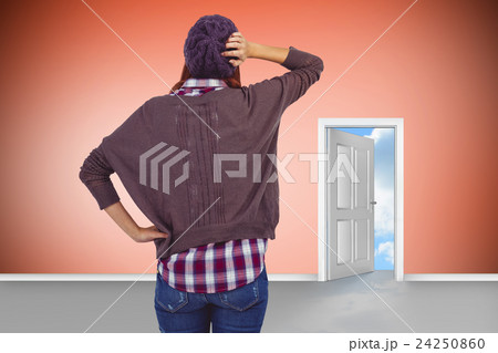 Composite image of rear view of a hipster woman Composite image of rear view of a hipster woman 24250860