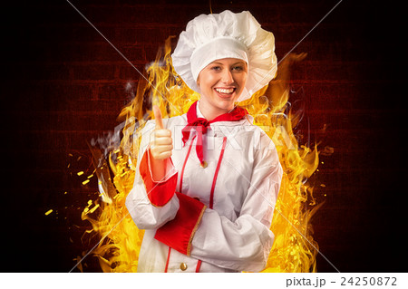 Composite image of pretty chef showing thumbs up Composite image of pretty chef showing thumbs up 24250872