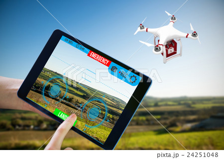 Composite image of finger pointing to tablet 24251048