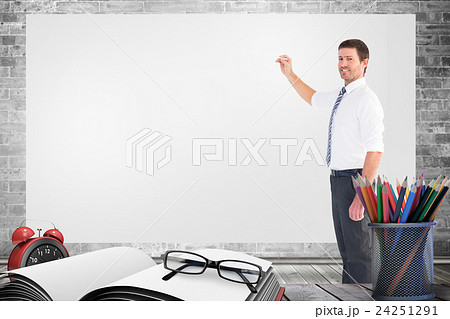 Composite image of businessman standing with his briefcase Composite image of businessman standing with his briefcase 24251291