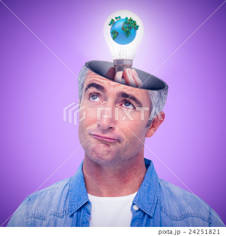 Composite image of hand holding environmental light bulb Composite image of hand holding environmental light bulb 24251821