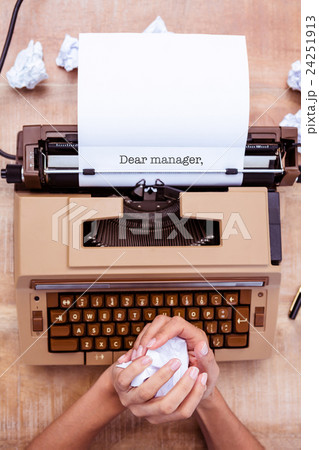 Dear manager, against above view of old typewriter Dear manager, against above view of old typewriter 24251913