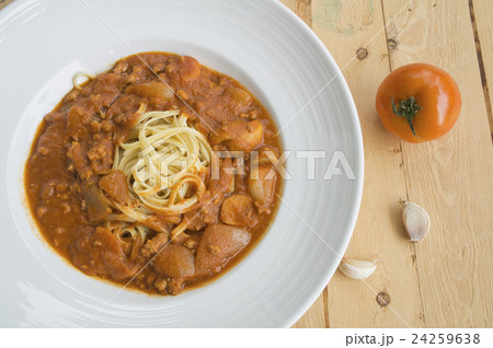 fresh homecook spaghett on wooden table fresh homecook spaghett on wooden table 24259638