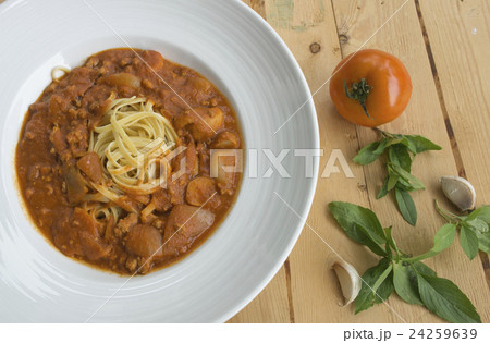 fresh homecook spaghett on wooden table fresh homecook spaghett on wooden table 24259639