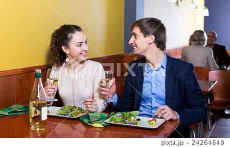 Couple having dinner at restaurant table Couple having dinner at restaurant table 24264649