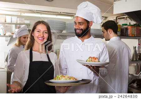waitress and cooking team at kitchen waitress and cooking team at kitchen 24264830