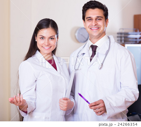 professional doctors smiling in clinic professional doctors smiling in clinic 24266354