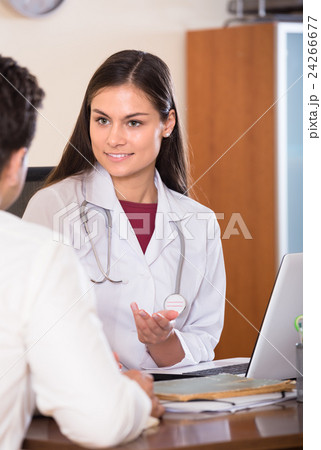 doctor receiving ill patient 24266677