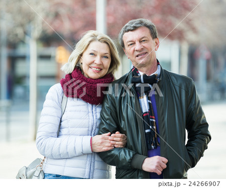 Portrait of loving elderly couple outdoors Portrait of loving elderly couple outdoors 24266907