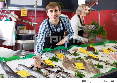 Mature and young sellers posing Mature and young sellers posing 24267138