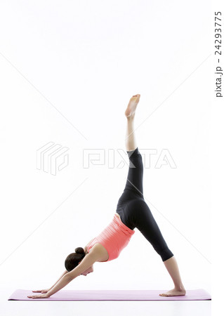 Young Asian Woman Practicing Yoga on the Mat - Isolated on White 24293775