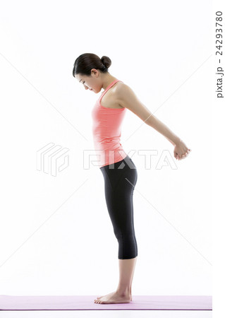 Young Asian Woman Practicing Yoga on the Mat - Isolated on White 24293780