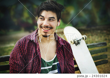 Skateboarding Sitting Relaxation Park Holiday Concept Skateboarding Sitting Relaxation Park Holiday Concept 24301024