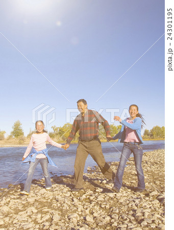 Mongolian Family Anjoy Walking by The River Concept Mongolian Family Anjoy Walking by The River Concept 24301195