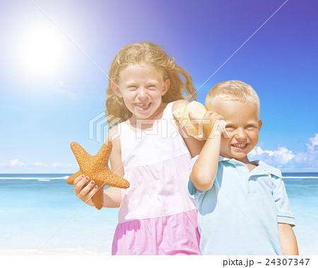 Brother and Sister having fun on the Beach 24307347