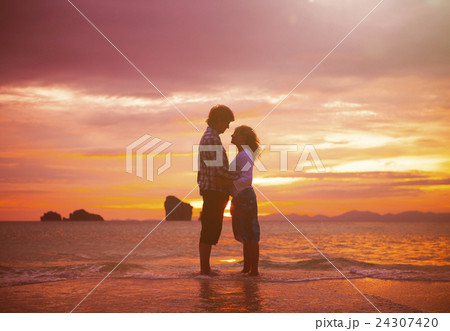 A couple on the beach 24307420