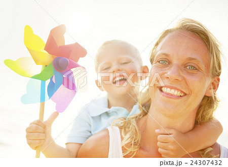 Mother and Son having fun on the beach 24307432