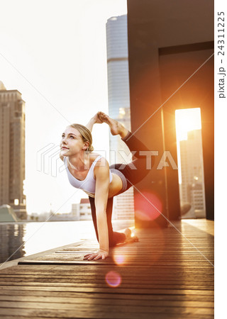 Woman Yoga Practice Pose Training Concept Woman Yoga Practice Pose Training Concept 24311225