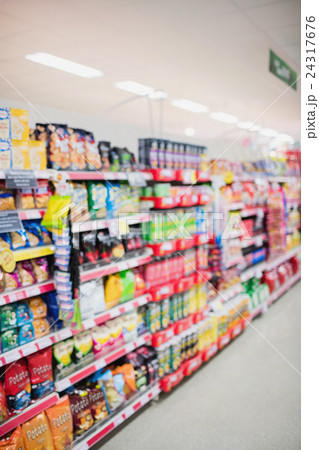 Side view of supermarket shelves Side view of supermarket shelves 24317676