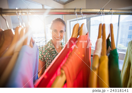 Woman posing with clothes Woman posing with clothes 24318141