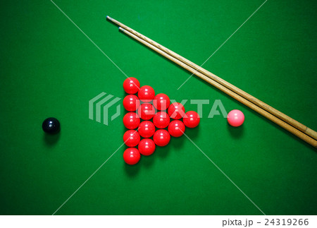 snooker balls set on a green table 24319266