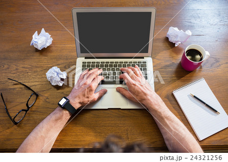Businessman working with a computer Businessman working with a computer 24321256