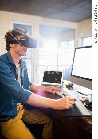 Businessman wearing virtual glasses Businessman wearing virtual glasses 24321431